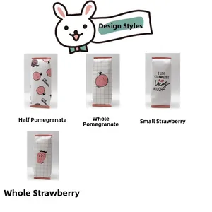 Detail view of four fruit patterns including strawberry and pomegranate on canvas pencil cases