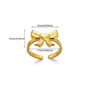 Detailed view of 18k gold butterfly heart ring with dimensions 15mm by 14mm