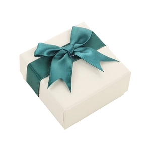 Elegant square jewelry gift box with cream base and dark green ribbon bow decoration
