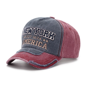 Detail of distressed canvas baseball cap with New York 3D embroidery and vintage patchwork