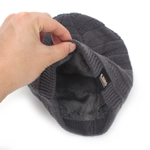 Men's dark gray knitted beanie with thick plush lining for winter outdoor warmth
