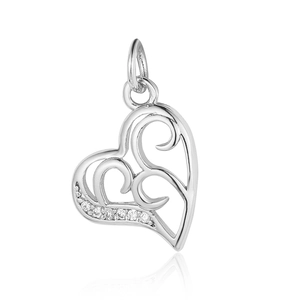Detail of silver heart-shaped hollow pendant with zircon inlay and smooth polished finish