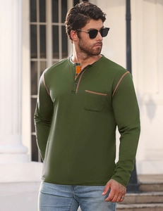 Detail of olive green long sleeve Henley shirt with orange contrast stitching on the pocket