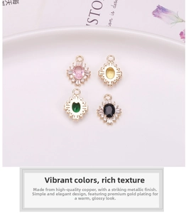 Macro detail of gold-plated sunburst pendants with colorful oval gems and zircon accents
