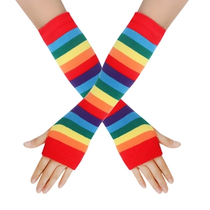 Close-up of rainbow striped long fingerless knitted gloves shown in an X-shaped pose