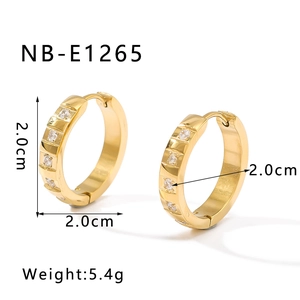 Detail view of 18K gold plated stainless steel hoop earrings with round cubic zirconia