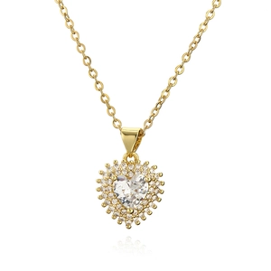 Elegant gold heart pendant necklace featuring a large central zircon and halo crystals