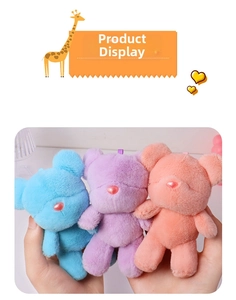 Detailed close-up of fluffy bear plush pendants with heart-shaped noses in pastel colors