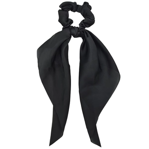 Elegant black satin hair scrunchie with long ribbons and smooth fabric luster
