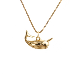 Polished gold-colored narwhal pendant necklace with box chain for women on white background