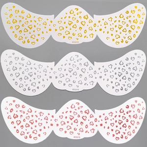 Detailed view of heart leopard pattern freckle tattoo stickers in gold, silver and red