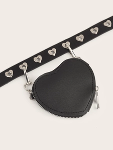 Detail of a mini heart-shaped PU leather pouch attached to a silver eyelet punk belt