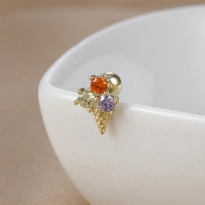 Macro detail of 18K gold stainless steel ice cream stud earring with colorful zircon stones