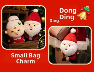 Close-up of small Santa Claus plush bag charms used as festive Christmas decorations