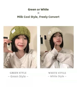 Detail of chunky knit beanies in green and cream with minimalist letter patches