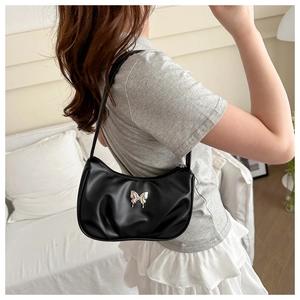 Chic black soft PU leather pleated shoulder bag with silver butterfly accent for women