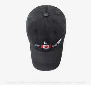 Top view of washed grey baseball cap featuring Canada and maple leaf embroidery