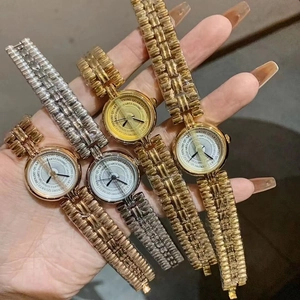 Handheld vintage gold and silver quartz bracelet watches by Dinimi in multiple colors