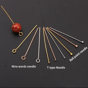 Assorted stainless steel eye pins, T-pins and ball head pins in gold and silver finishes