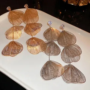 Elegant gold and silver tassel drop earrings with tiered mesh fans and crystal studs