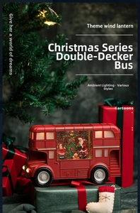 Close-up of red Christmas bus lantern with Santa and glitter snow scene inside