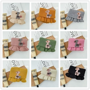 Kids' knitted neck warmer featuring ruffled edges and cute giraffe patches in 9 colors