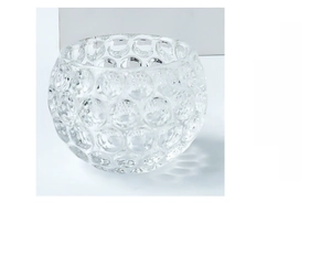 Detailed view of heat-resistant glass candle holder with textured bubble patterns