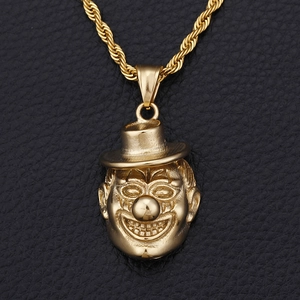 Hip hop style gold joker pendant necklace with rope chain on black leather background