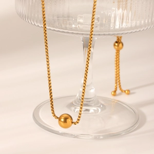18K gold plated stainless steel box chain necklace with bead pendant on glass
