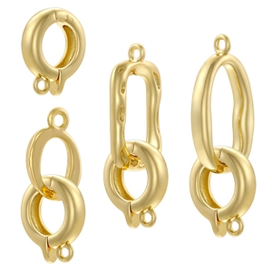 Detail of 18K gold-plated oval clasp with spring ring and links for jewelry making