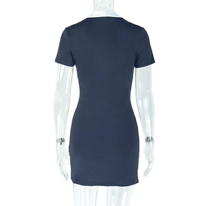 Rear view of a navy short-sleeved dress with a white contrast collar on an invisible model