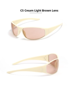 Macro detail of Y2K cycling sunglasses in beige with light brown lenses and wide temples