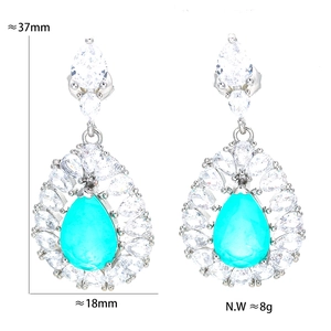 Vintage palace style drop earrings with teal blue synthetic sapphire and white zircons