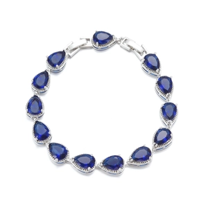 Elegant silver bracelet featuring AAA blue teardrop cubic zirconia for bridal wedding wear