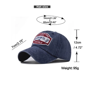 Detail view of washed cotton baseball cap showing embroidery and dimensions