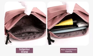 Detail view of pink nylon crossbody bag interior showing spacious capacity and zip pocket
