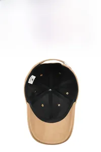 Detailed interior of men's winter baseball cap showing stitching and label