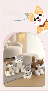Detail of plush husky toys in grey and brown showing soft fur and blue realistic eyes