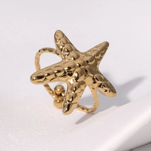 Minimalist gold starfish open ring in stainless steel with elegant textured metal finish
