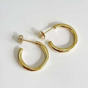 Minimalist 925 sterling silver C-shaped hoop earrings in gold with a polished mirror finish