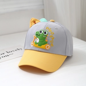 Detail of grey and yellow kids dinosaur cap with cartoon skate dinosaur and soft fin