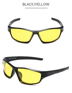 Detailed view of yellow night vision sport sunglasses with UV400 black frames