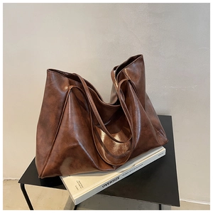 Large dark brown shiny leather tote bag for women, stylish oversized shoulder bag for commute