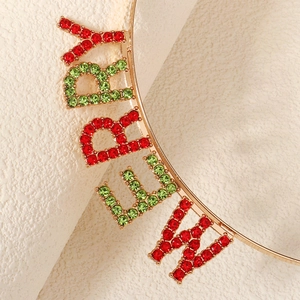 Golden Christmas headband with sparkling red and green rhinestone MERRY lettering design