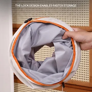 Foldable grey Oxford cloth cat tunnel toy with orange trim and quick storage lock