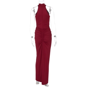 Detail of burgundy halter maxi dress showing the pleated back seam and zipper closure