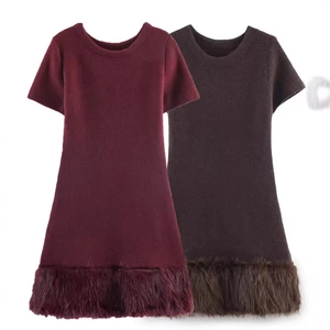 Short sleeve crew neck dress with faux fur hem in burgundy and dark brown colors