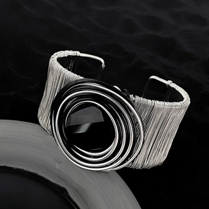 Layered wrap open cuff bracelet in silver wire with black and white resin circle detail