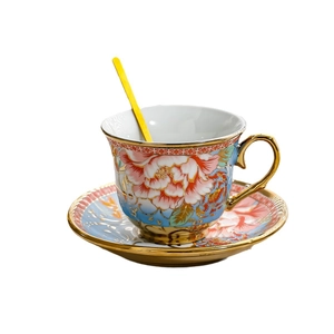 Elegant European ceramic coffee cup set with floral peony patterns and gold spoon on white background