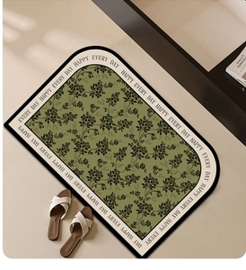 Detail of semi-circular floral bath mat with Every Day Happy text and anti-slip texture